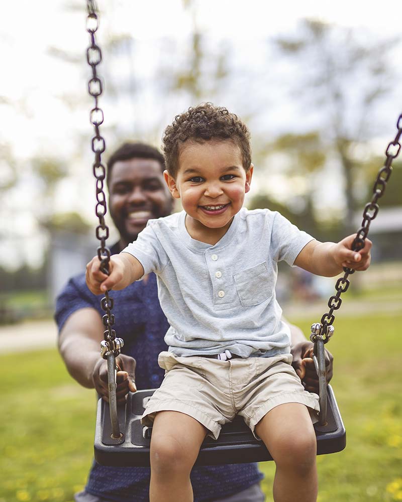 Father and son on the playground